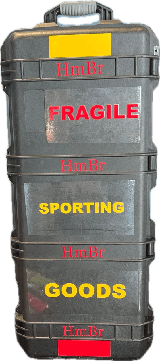 The HmBr sealed hard case standing upright, with HmBr branding on the latches and FRAGILE and SPORTING GOODS labels